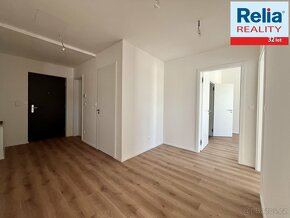 Prodej bytu 4+kk s balkónem 108 m2, 2 park. stání v centru L - 17