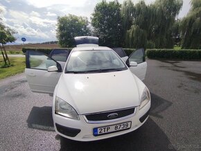 Prodám Ford Focus 1.4i 16V 59Kw r.v.2006 Nová STK,bez koroze - 19