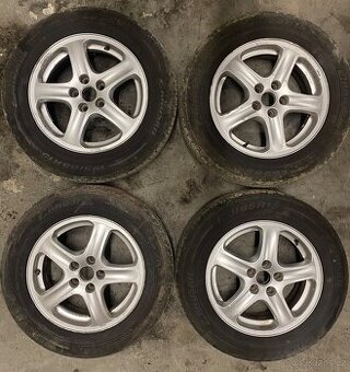 ALU R15 5x100 oteg Škoda na slušných 195/65 R15