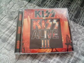 KISS - RAGE AGAINST THE...  CD A JINÉ