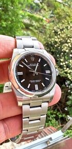 Rolex oyster perpetual black 116000