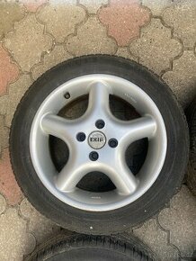 ALU kola EXIP 4x100 195/50 R15 letní pneu 7Jx15H2 ET 35