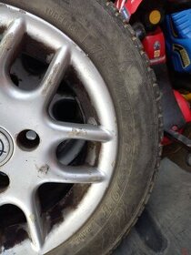 Kola z Opel Corsa 4x100 (165/70 R13)