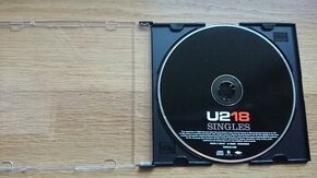 CD - U2 18 Singles bez originál obalu a bookletu. Každé 2. C