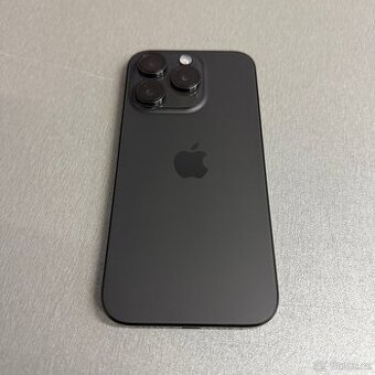 iPhone 15 Pro 128GB black titan, pěkný stav, rok záruka