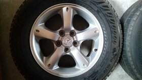 alukola FORD 16",5x114,3 + letní Nokian SUV 215/70/16