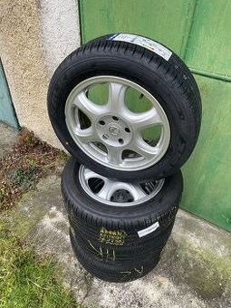 Letní sada original Alu disků 5x114,3 a pneu 205/55 R16