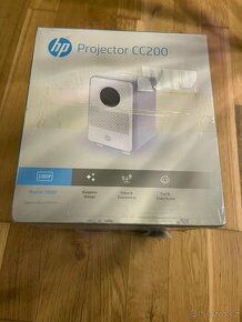 Projektor HP CC200 + skládané plátno 84"