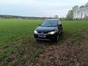 Mitsubishi Outlander 2.0 DiD, 103 kw, 4x4, 7 míst