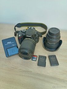 Nikon D5100(10250 exp.) + 2 objektiva + 2 baterie