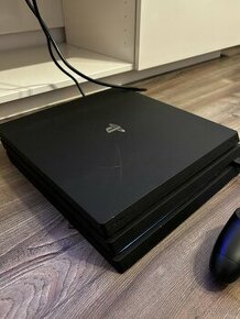 Prodam Ps4 Pro + ovladač + hra