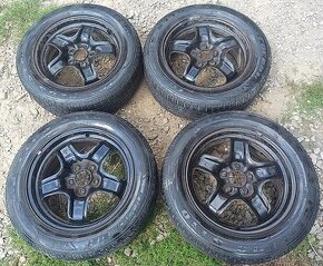 GM - Opel 16J ráfky se zimními pneu 205/55R16 a vzorkem 5mm