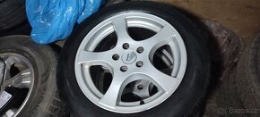 16" Zimni alu Ford Volvo 5x108 205/55 R16