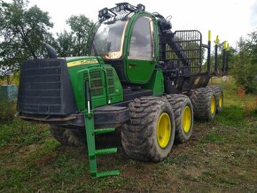 Vyvážečka John Deere 1110E