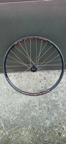 Zapletené zadní 26" kolo DWR Disc 559x19c