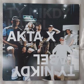 Akta X - Ty Nikdy label