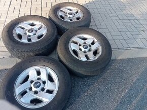 Levné 16" celoroční al kola Hyundai Terracan 6x139.7