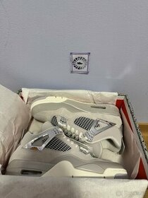 Jordan 4 Frozen Moments - 1