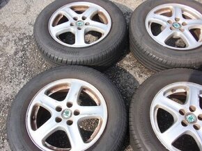 Alu kola Octavia 5x100 R15 s pneu Bridgestone - 1