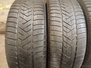 Zimní 235/60 R18