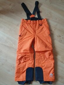 Oteplováky lyžařské kalhoty lupilu v.110/116 oranžové