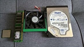 Chladič, paměti a CPU na socket 478 a HDD IDE 40GB.