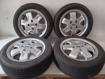 Letní alu kola Ford 4x108 R15 ET52,5 pneu 185/55/15/Tomket