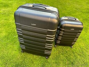 Prodam cestovní kufry - použité jednou na dovolenou