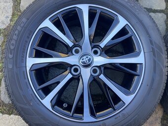 Alu kola TOYOTA YARIS 15" 4x100 letní BRIDGESTONE 175/65R15 - 2