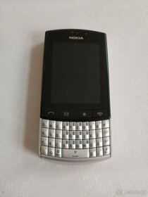 Nokia Asha 303 s baterií a s nabíječkou - 2