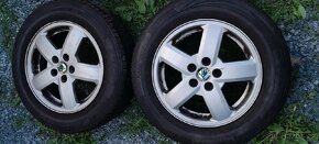 Skoda 4x alu s pneu  6Jx15H ET38 - 2