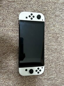 Nintendo Switch oled + příslušenství a hry - 2