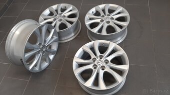 Alu kola Mazda 7Jx17 ET-52,5 5x114,3x67 - 2