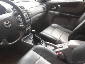 Interiér Mazda 323F BJ - sedadla a tapecí - 2