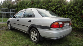 Mazda 323 1.5i 65kw rok 1997 STK 04/2025 původ ČR - 2