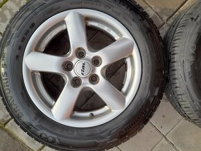 SADA ALU KOL VEL. 15" ROZTEČ 5x108 PNEU 195/65 R15 - 2