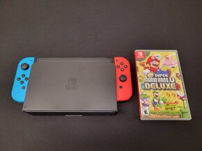 Nintendo Switch OLED 64GB + Mario Bros Deluxe U - 2