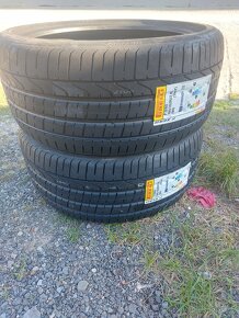 Prodám 2ks lentich pneu Pirelli 285/35 ZR22 - 2