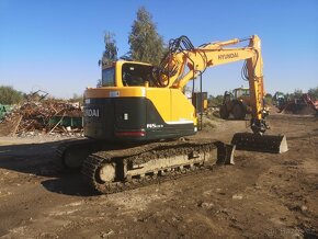 Pasovy bagr Hyundai 145 lrc9.ne Cat.Jcb - 2