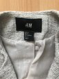 Bílý křivák se stříbrnou nití H&M. - 2