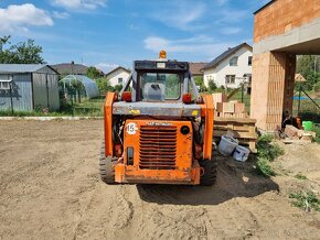 Smykový nakladač Hitachi, New Holland - 2