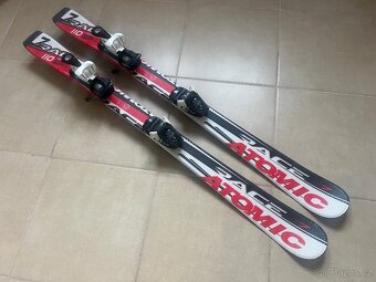 Lyže Atomic 110, lyžáky Rossignol 265 mm, hůlky 85 cm - 2