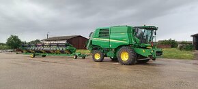 John Deere 670i HM - 2