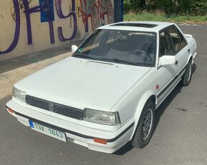 Nissan Bluebird 2.0 SLX, 1990 , T72 . - 2