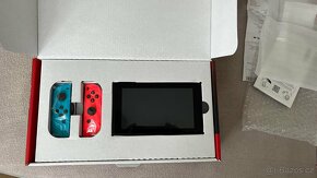 Nintendo Switch Joy Con v2 - červená/modrá - 2