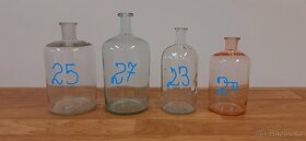 lékárenské láhve, 4 ks, 3 čiré+1 růž.sklo, v.25,27,23,20cm - 2