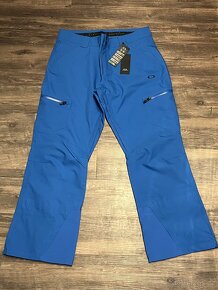 Nové Lyžařské kalhoty Oakley modré, velikost L - 2