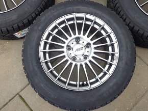 Opel Astra Insignia Zafira C-tourer zimna sada 215/60R16 - 2