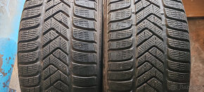 2 zimní pneumatiky PIRELLI 255/45R19 104V 7,00mm DOT 2021 - 2