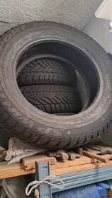 Prodám celoroční pneu Dunlop m+s 185/65 R15 - 2